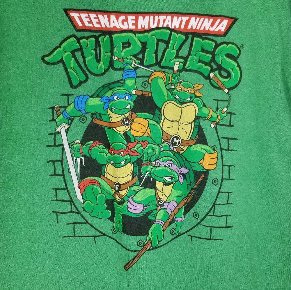 Teenage Mutant Ninja Turtles Size L. Sewer Shirt